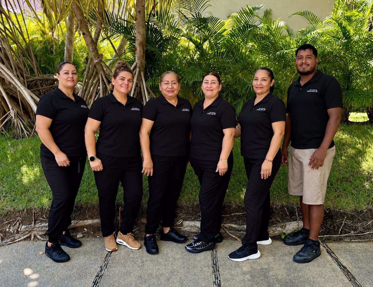 Group photo of the housekeeping and maintenance team who look after the homes Beyond Traveling manages in Punta Mita